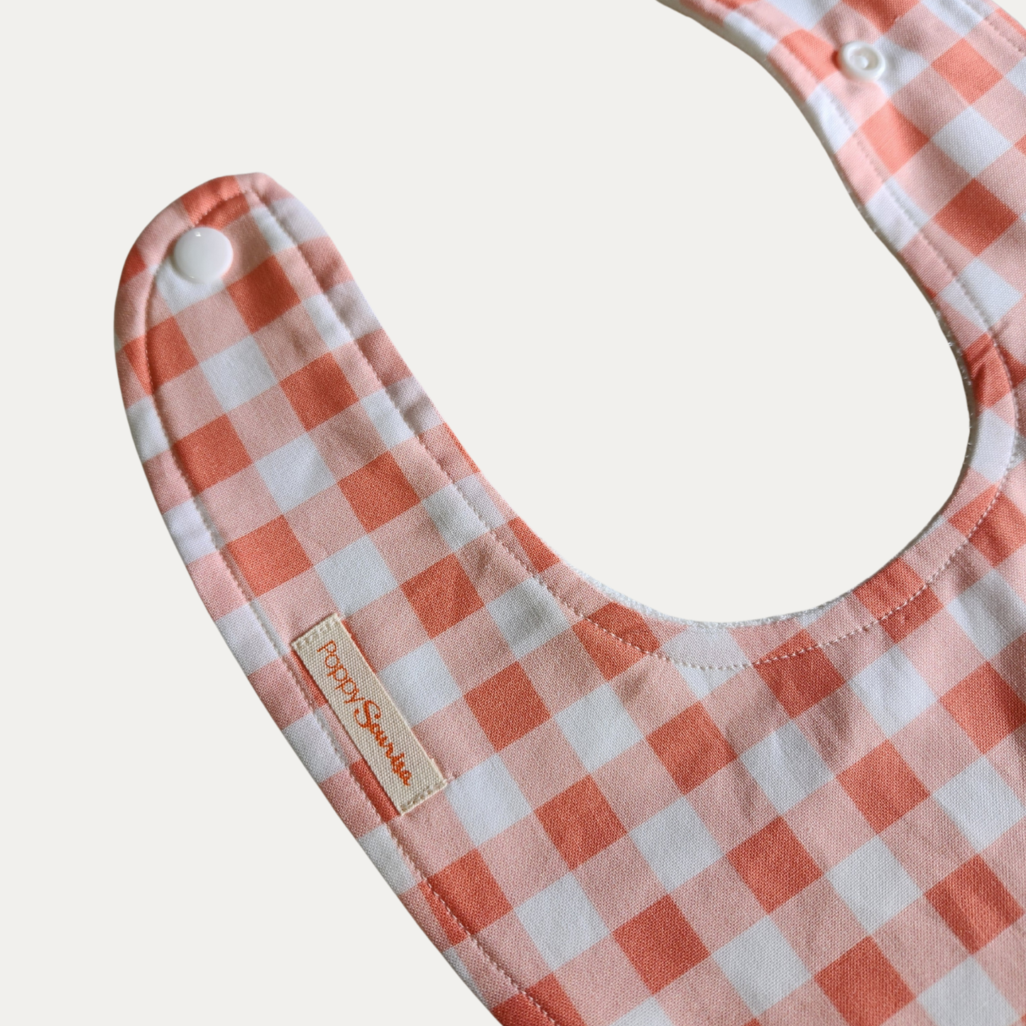 DRIBBLE BIB | CORAL GINGHAM